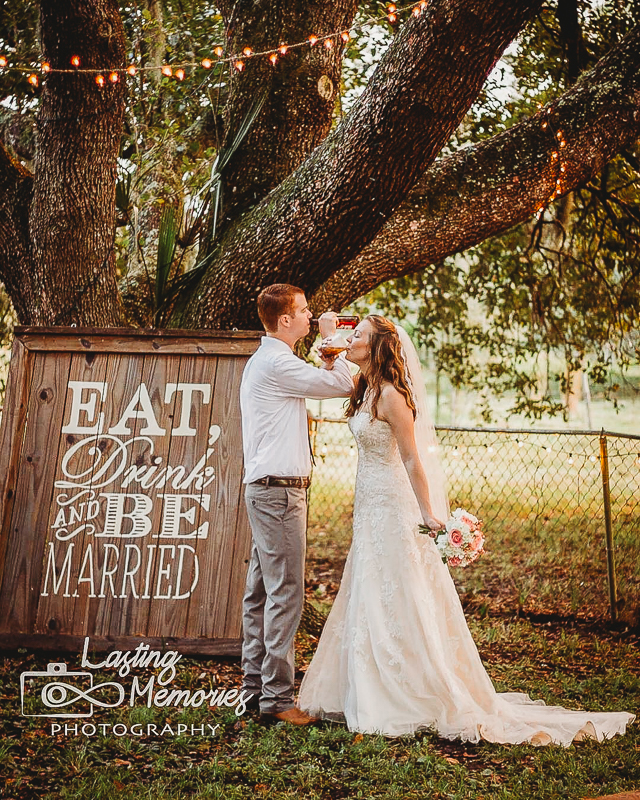 Bride and groom under the stunning oaks of Mims, Florida