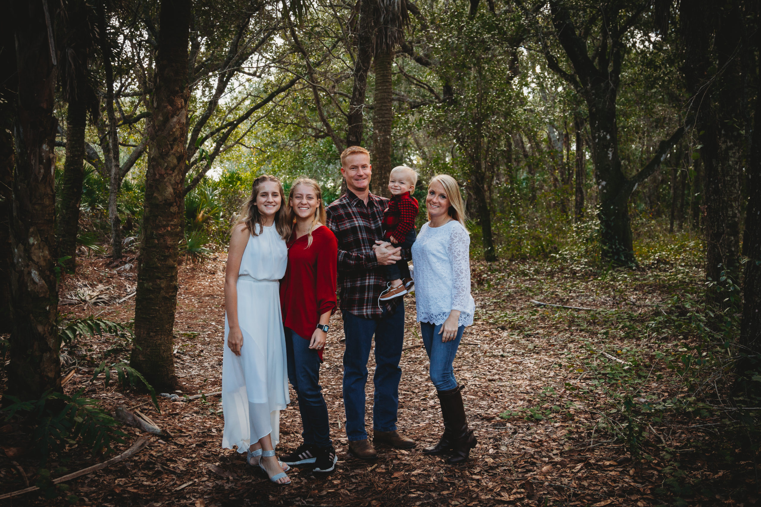 Family enjoying the South Florida Wooded landscape